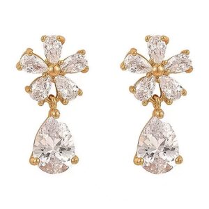 Złote kolczyki z kokardką i błyszczącymi cyrkoniami dla kobiet - eleganckie i modna biżuteria